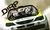 Size: 2000x1191 | Tagged: safe, artist:br0ny, derpy hooves, dinky hooves, pegasus, pony, unicorn, g4, bobblehead, car, crossover, dc shoes, derpy driving, driving, equestria's worst mother, feather, featured image, female, filly, food, ken block, mare, monster energy, muffin, open mouth, parody, photoshop, scared, screaming, smiling, subaru, subaru impreza, this will end in tears, video game, wallpaper, wide eyes, world rally championship