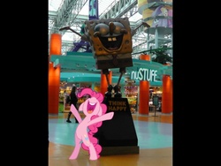 Size: 600x450 | Tagged: source needed, safe, pinkie pie, earth pony, pony, g4, backpack, backpack (dora the explorer), bipedal, dora márquez, dora the explorer, happy, irl, mall of america, map, map (dora the explorer), nickelodeon universe, photo, ponies in real life, smiling, spongebob squarepants, statue