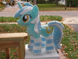 Size: 900x675 | Tagged: safe, artist:karasunezumi, lyra heartstrings, pony, unicorn, g4, clothes, female, irl, mare, outdoors, photo, plushie, socks, solo, striped socks