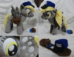 Size: 2412x1884 | Tagged: safe, artist:cryptic-enigma, derpy hooves, pegasus, pony, g4, female, hat, irl, mailbag, mailmare, mare, muffin, photo, plushie, solo