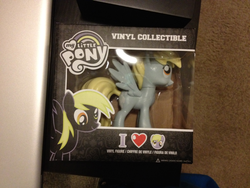 Size: 1000x750 | Tagged: safe, derpy hooves, pegasus, pony, g4, official, box, female, funko, irl, mare, multilingual packaging, photo, that one nameless background pony we all know and love, toy