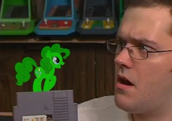 Size: 888x624 | Tagged: safe, pinkie pie, earth pony, human, pony, g4, angry video game nerd, glitch gremlin, irl, irl human, photo, ponies in real life