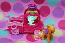 Size: 637x424 | Tagged: safe, applejack, lyra heartstrings, g4, applejack truck, brushable, hasbro, irl, photo, sitting, sitting lyra, toy