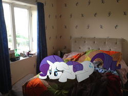 Size: 3264x2448 | Tagged: safe, artist:pangbot, rarity, pony, unicorn, g4, bedroom, floppy ears, high res, irl, photo, ponies in real life, pouting, prone, sad, solo, underhoof, vector