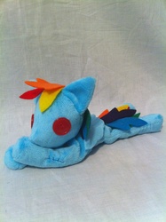 Size: 1936x2592 | Tagged: safe, artist:planetplush, rainbow dash, pegasus, pony, g4, beanie (plushie), folded wings, irl, lying down, photo, plushie, prone, ragdoll, solo, wings