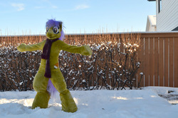 Size: 700x464 | Tagged: safe, artist:temperance, oc, oc only, oc:temperance, clothes, fence, fursuit, irl, outdoors, photo, scarf, snow, solo, spread arms