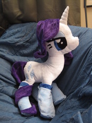 Size: 2736x3648 | Tagged: safe, artist:munchforlunch, rarity, pony, g4, bedroom eyes, clothes, high res, irl, photo, plushie, socks, solo