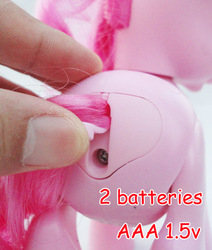 Size: 594x700 | Tagged: safe, pinkie pie, human, g4, battery slot, butt, hand, irl, photo, plot, screw, toy, unfortunate design, walkin' talkin' pinkie pie