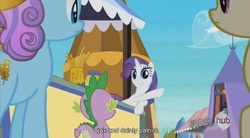 Size: 849x470 | Tagged: safe, screencap, rarity, spike, crystal pony, dragon, unicorn, g4, the crystal empire, ajax, crystal empire, dainty patrick, the hub, youtube caption