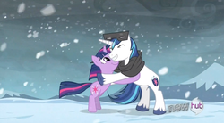 Size: 848x469 | Tagged: safe, screencap, shining armor, twilight sparkle, pony, unicorn, g4, season 3, the crystal empire, cute, female, hug, male, mare, shining adorable, snow goggles, stallion, twiabetes