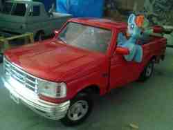 Size: 900x675 | Tagged: safe, rainbow dash, g4, female, image macro, irl, photo, toy, truck