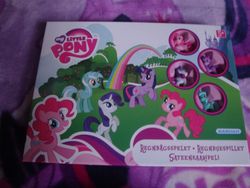 Size: 1000x750 | Tagged: safe, lyra heartstrings, pinkie pie, rarity, twilight sparkle, pony, g4, official, blind bag, board game, danish, finnish, irl, merchandise, multilingual packaging, my little pony logo, norwegian, photo, rainbow, special face, stock vector, swedish, toy, twiface