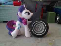 Size: 900x675 | Tagged: safe, rarity, pony, g4, blind bag, diorama, irl, photo, scale model, solo, tire, toy