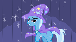 Size: 1600x893 | Tagged: safe, artist:anitech, trixie, g4, grin, lidded eyes, looking at you, raised hoof, smiling, sparkles, stage