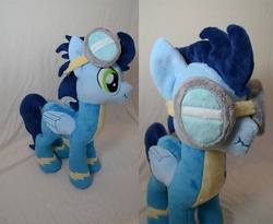 Size: 1000x821 | Tagged: safe, artist:makeshiftwings30, soarin', pegasus, pony, g4, clothes, folded wings, goggles, irl, photo, plushie, scrunchy face, solo, uniform, wings, wonderbolts uniform