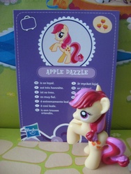 Size: 480x640 | Tagged: safe, artist:twilightberry, apple bumpkin, pony, g4, official, apple family member, collector card, irl, multilingual packaging, photo, solo, toy