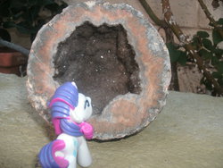 Size: 2048x1536 | Tagged: safe, rarity, pony, g4, blind bag, irl, photo, rock, solo, toy