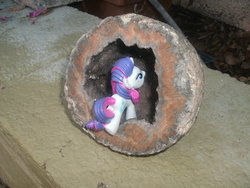 Size: 2048x1536 | Tagged: safe, rarity, pony, g4, blind bag, irl, photo, rock, solo, toy