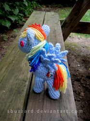Size: 800x1067 | Tagged: dead source, safe, artist:sbuzzard, rainbow dash, pegasus, pony, g4, amigurumi, bench, crochet, female, irl, mare, outdoors, photo, plushie, solo, spread wings, wings