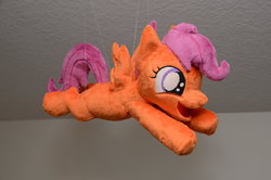 Size: 800x530 | Tagged: safe, artist:makeshiftwings30, scootaloo, pony, g4, flying, happy, irl, photo, plushie, solo