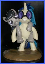 Size: 1940x2740 | Tagged: safe, artist:madponyscientist, dj pon-3, octavia melody, vinyl scratch, g4, female, irl, lesbian, photo, ponies riding ponies, riding, sculpture, ship:scratchtavia, shipping