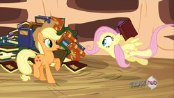 Size: 1280x720 | Tagged: safe, screencap, applejack, fluttershy, earth pony, pegasus, pony, g4, magic duel, my little pony: friendship is magic, book, duo, duo female, female, golden oaks library, mare