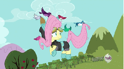 Size: 576x324 | Tagged: safe, screencap, fluttershy, bird, blue jay, pegasus, pony, g4, magic duel, season 3, animated, bunny ears, carrying, clothes, cute, dangerous mission outfit, female, flying, goggles, hoodie, hoofy-kicks, kidnapped, mare, running, running in place, shyabetes, solo, songbird