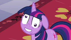 Size: 1280x720 | Tagged: safe, edit, edited screencap, screencap, twilight sparkle, pony, g4, the crystal empire, caption, derp, female, inverted mouth, smiling, solo
