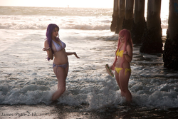 Size: 900x600 | Tagged: safe, artist:cessatia, artist:quinnthecat, edit, fluttershy, rarity, human, g4, beach, belly button, bikini, clothes, cosplay, derpygate, irl, irl human, photo, sandwich, swimsuit