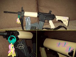 Size: 900x675 | Tagged: safe, fluttershy, g4, ar-15, customized toy, cutie mark, gun, gunified, irl, meta, my little arsenal, photo, rifle, toy, weapon, yay