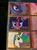 Size: 1936x2592 | Tagged: safe, princess celestia, princess luna, twilight sparkle, alicorn, pony, unicorn, g4, card, female, gold series, irl, mare, merchandise, my little pony logo, photo, trading card, unicorn twilight, vector