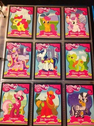 Size: 1936x2592 | Tagged: safe, apple bloom, big macintosh, cheerilee, granny smith, princess cadance, scootaloo, shining armor, sweetie belle, zecora, pony, zebra, g4, card, irl, merchandise, photo, trading card