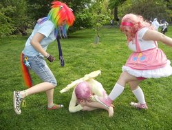 Size: 600x450 | Tagged: safe, fluttershy, pinkie pie, rainbow dash, human, .mov, shed.mov, g4, abuse, barefoot, converse, cosplay, feet, flutterbuse, irl, irl human, photo, welcome to ponyville