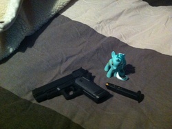 Size: 2592x1936 | Tagged: safe, lyra heartstrings, pony, g4, airsoft, brushable, gun, irl, joke, photo, toy