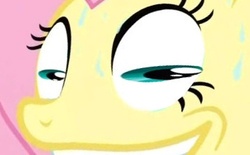 Size: 337x209 | Tagged: safe, edit, edited screencap, screencap, fluttershy, pegasus, pony, g4, magic duel, season 3, creepy, creepy grin, creepy smile, cropped, female, great moments in animation, grin, horizontal pupils, inverted mouth, mare, pink hair, pink mane, rapeface, smear frame, smiling, sweat, teal eyes, yellow coat, yellow fur, yellow pony, zoomed in