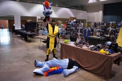 Size: 780x518 | Tagged: safe, rainbow dash, human, pegasus, g4, cosplay, decapitated, fatality, head, irl, irl human, mortal kombat, photo, ponysuit, scorpion (mortal kombat), severed head