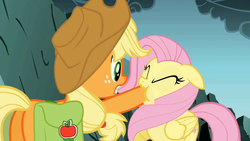 Size: 1024x576 | Tagged: safe, screencap, applejack, fluttershy, earth pony, pegasus, pony, dragonshy, g4, season 1, animation error, butt, female, hoof in mouth, hoofjack, mare, mouth, plot, they just didn't care