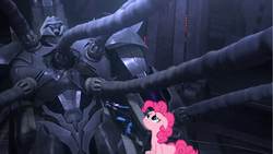 Size: 1281x720 | Tagged: safe, edit, pinkie pie, earth pony, pony, g4, female, hot nuts, mare, megatron, sad, sitting, transformers, transformers prime