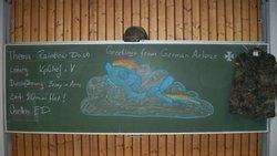Size: 780x440 | Tagged: safe, rainbow dash, pegasus, pony, g4, chalkboard, clothes, cloud, eyes closed, female, german, mare, military, on back, photo, solo, traditional art, uniform