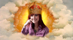 Size: 800x441 | Tagged: safe, human, crown, female, god, irl, irl human, jewelry, lauren faust, monty python, monty python and the holy grail, photo, regalia, solo
