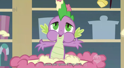 Size: 853x471 | Tagged: safe, screencap, spike, dragon, g4, griffon the brush off, my little pony: friendship is magic, season 1, cake, ei, food, hub logo, logo, male, solo, sugarcube corner, the hub, youtube caption