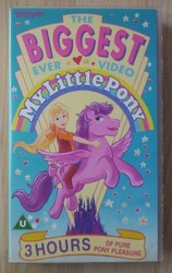 Size: 367x580 | Tagged: safe, firefly, megan williams, human, pegasus, pony, g1, cover, female, humans riding ponies, mare, meganfly, my little pony logo, pure pony pleasure, riding, vhs