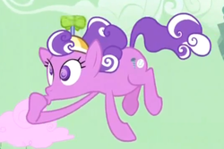 Size: 569x379 | Tagged: safe, screencap, screwball, earth pony, pony, g4, the return of harmony, cloud, cotton candy, cotton candy cloud, female, flying, food, green sky, hat, mare, propeller hat, solo, swirly eyes