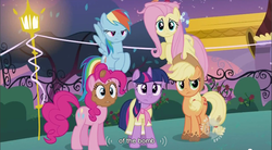 Size: 856x473 | Tagged: safe, screencap, applejack, fluttershy, pinkie pie, rainbow dash, twilight sparkle, pegasus, pony, unicorn, g4, sweet and elite, birthday dress, bomb, clothes, dress, female, hub logo, weapon, youtube caption