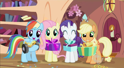 Size: 852x468 | Tagged: safe, screencap, applejack, fluttershy, rainbow dash, rarity, earth pony, pegasus, pony, unicorn, g4, secret of my excess, applejack's hat, cowboy hat, cute, dashabetes, eyes closed, female, hat, jackabetes, looking at you, mare, open mouth, open smile, present, raribetes, shyabetes, smiling, weights