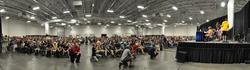 Size: 4886x1361 | Tagged: safe, artist:spainfischer, bronycon, bronycon 2012, andrea libman, convention, crowd, drum kit, drums, fursuit, irl, john de lancie, lauren faust, male, meta, musical instrument, nicole oliver, panorama, peter new, photo, spider-man