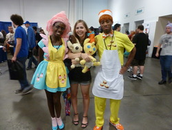 Size: 1280x960 | Tagged: safe, artist:tigerlillys, carrot cake, cup cake, pound cake, pumpkin cake, human, bronycon, bronycon 2012, g4, cosplay, cupcake, irl, irl human, jenny nicholson, photo, plushie, toy