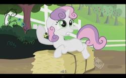 Size: 640x400 | Tagged: safe, screencap, sweetie belle, pony, unicorn, g4, sisterhooves social, female, filly, foal, hay bale, horn, hub logo, youtube caption