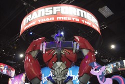 Size: 1280x853 | Tagged: safe, twilight sparkle, pony, g4, hasbro booth, irl, optimus prime, photo, ponies in real life, san diego comic con, transformers, vector