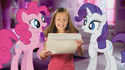 Size: 853x480 | Tagged: dead source, safe, screencap, pinkie pie, rarity, earth pony, human, pony, unicorn, g4, official, commercial, exploitable, irl, looking down, photo, ponies in real life, pony wedding, reaction, scroll, youtube link